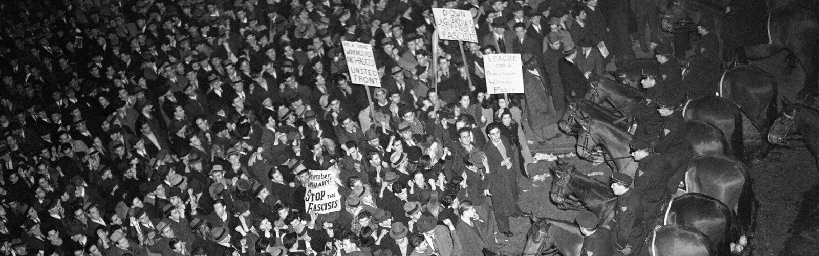 In 1939, New York's mounted police form a solid line outside Madison Square Garden to hold in a crowd that had packed the streets around the venue where the fascist German American Bund was holding a rally.