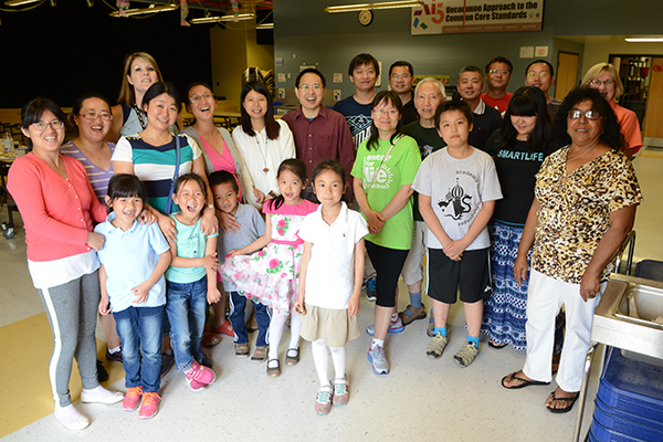 Families who participated in the Toyota Learning Center program celebrate the school year's end