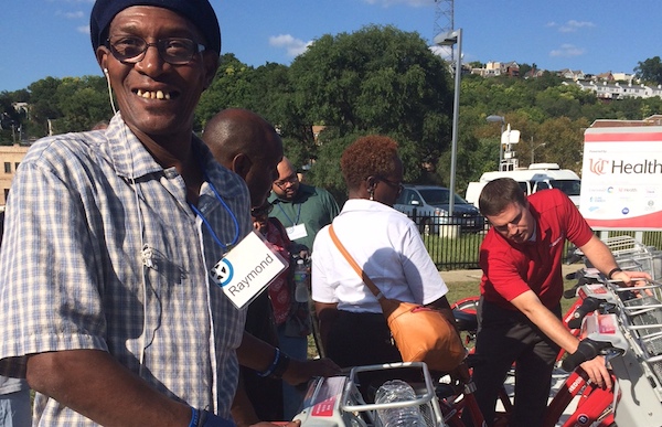 Red Bike's Jason Barron (right) provides pointers to CityLink members