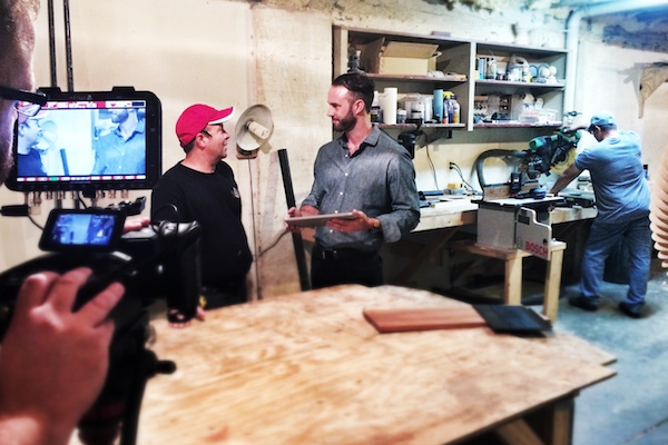 CraftForce founder Dustin Grutza (center) is filmed for "Innovations With Ed Begley Jr." on Discovery Channel