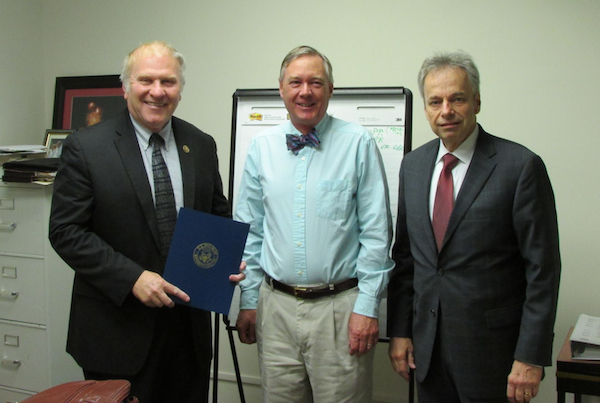 HCDC's Andrew Young (center) is recognized as Ohio SBA Financial Advocate of the Year by Rep. Steve Chabot and HCDC President David Main