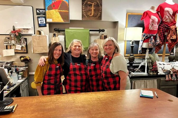 Owner Heidi Barrett lovingly stocks Faded Finds with curated finds and one-of-a-kind gifts. It’s super festive for the holiday season.  From left to right, the staff of Faded Finds (Marybeth Newman, owner Heidi Barrett, Marsha Berry and Lisa Orem.