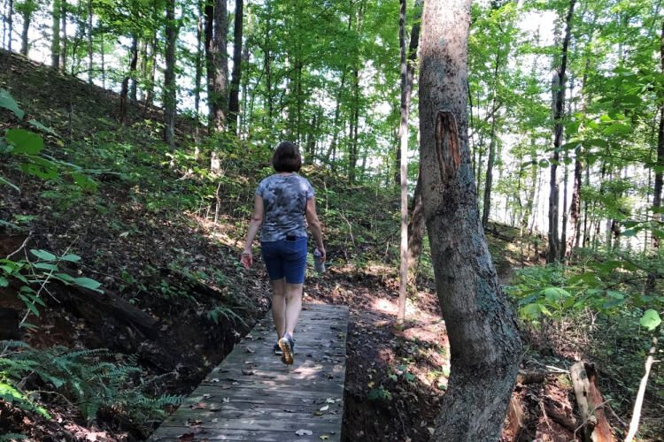 The rustic 4.3-mile trail at Buzzardsroost Rock Preserve, located in Adams County, offers rolling terrain that shifts from open prairies to heavily wooded areas. Buzzardsroost first opened to the public in 1967.