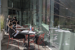 Visitors enjoy autumn sunshine on the CAC patio.