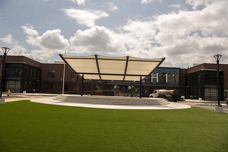 The Lawn features public greenspace and a stage.