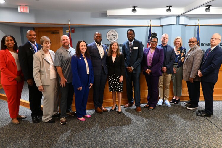 Representatives from Hamilton County, LISC, Working in Neighborhoods, Habitat for Humanity, Warsaw Federal, Cincinnati City Council, United Way, Greater Cincinnati Foundation.