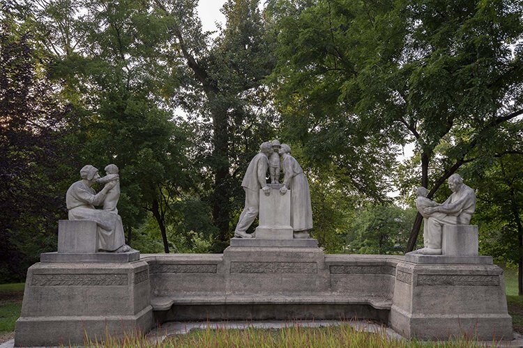 The Family Statuary was carved by a French sculptor and imported from Paris in the 1920s.