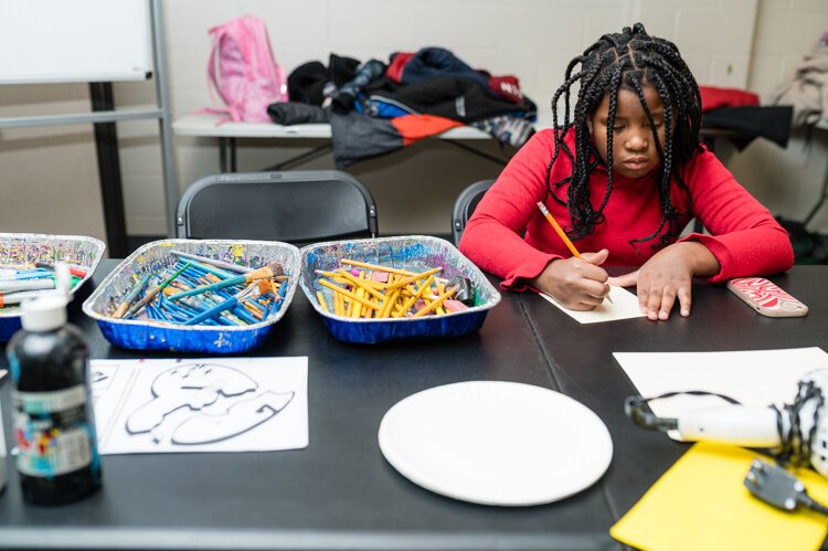 Art and mentoring are part of the Guidlng Light after-school program in the West End neighborhood. 